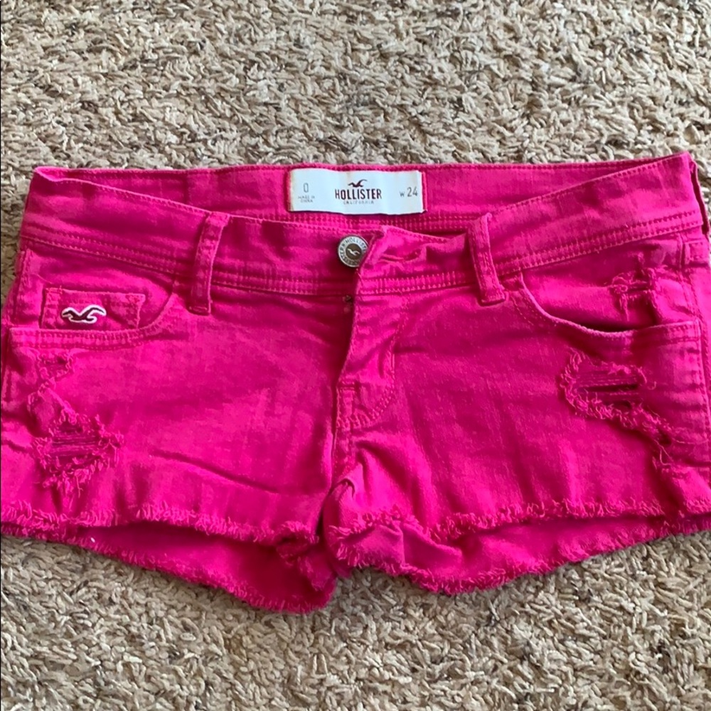 Hollister pink distressed low rise shorts